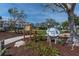 Welcoming entrance to Friendship Park with a clear view of the grassy expanse and benches at 16315 2Nd E St, Redington Beach, FL 33708