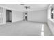 Spacious living room with light terrazzo floors and recessed lighting at 16315 2Nd E St, Redington Beach, FL 33708