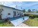 A cozy back patio for relaxing or entertaining in a private outdoor setting at 16315 2Nd E St, Redington Beach, FL 33708