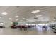 Spacious community room with laminate flooring and ample seating, ideal for social gatherings and events at 1847 Shore Drive South # 308, South Pasadena, FL 33707