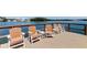 Dockside seating provides stunning views of the tranquil water, creating a perfect spot for relaxation and leisure at 1847 Shore Drive South # 308, South Pasadena, FL 33707