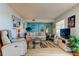 Inviting living room with comfortable seating, modern decor, and lots of light at 1847 Shore Drive South # 308, South Pasadena, FL 33707