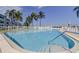 Bright, inviting community pool offering residents a refreshing way to enjoy waterfront views and outdoor recreation at 1847 Shore Drive South # 308, South Pasadena, FL 33707