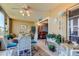 Relaxing sitting area featuring bright light and an adjacent cozy breakfast nook at 1847 Shore Drive South # 308, South Pasadena, FL 33707