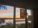 Stunning water view at sunset featuring a tranquil river and colorful sky at 1847 Shore Drive South # 308, South Pasadena, FL 33707