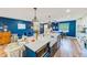 Spacious kitchen island with a white countertop and modern appliances in an open-concept layout at 1851 Glenville Dr, Clearwater, FL 33765