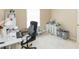 Bedroom with desk area features natural light and carpet flooring throughout at 220 Sawtooth Dr, Valrico, FL 33594