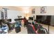 This bedroom has a large window and contains a desk with multiple gaming accessories at 220 Sawtooth Dr, Valrico, FL 33594