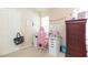This bedroom is well-lit and features a desk, chair, and dresser with drawers at 220 Sawtooth Dr, Valrico, FL 33594