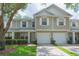 Inviting two-story townhome with a one car garage and charming curb appeal at 220 Sawtooth Dr, Valrico, FL 33594