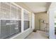 Covered porch with white pillars and detailed windows at 220 Sawtooth Dr, Valrico, FL 33594
