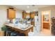 Well-equipped kitchen featuring ample counter space, wooden cabinets, and modern appliances at 220 Sawtooth Dr, Valrico, FL 33594