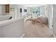 Spacious bonus room with plush carpet, recessed lighting, and a large window at 2904 W Averill Ave, Tampa, FL 33611