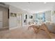 Spacious living room with carpeted floor, neutral paint, and plenty of natural light at 2904 W Averill Ave, Tampa, FL 33611