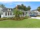 Charming home with landscaped front yard, and inviting front porch at 2910 W Aquilla St, Tampa, FL 33629