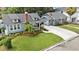 Well-manicured lawn and landscaped front yard of charming home at 2910 W Aquilla St, Tampa, FL 33629