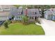 Charming home with landscaped front yard, welcoming porch, and well-maintained lawn at 2910 W Aquilla St, Tampa, FL 33629