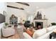 Cozy living room with fireplace, comfortable seating, and stylish decor at 2910 W Aquilla St, Tampa, FL 33629