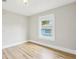Bright, airy bedroom with wood-look floors and fresh paint throughout at 2920 E 20Th Ave, Tampa, FL 33605