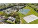 The tennis courts, basketball court and beach volleyball area offer residents many recreational activities at 30174 Southernwood Ct, Wesley Chapel, FL 33543