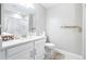 Bright bathroom features a white vanity, neutral paint, and modern fixtures at 31408 Cabana Rye Ave, San Antonio, FL 33576
