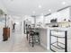 Well-lit kitchen features a breakfast bar, stainless steel appliances, and ample cabinet space for all your cooking needs at 31408 Cabana Rye Ave, San Antonio, FL 33576