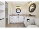 Bright bathroom features dual sinks, granite countertops, and modern finishes at 3252 Scorecard Dr, New Port Richey, FL 34655