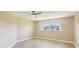 Neutral bedroom with a large window that allows plenty of natural light at 3252 Scorecard Dr, New Port Richey, FL 34655