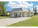 Charming home exterior with a convenient covered carport and well-maintained landscaping at 3252 Scorecard Dr, New Port Richey, FL 34655