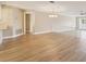 A spacious living area featuring modern flooring and abundant natural light at 3252 Scorecard Dr, New Port Richey, FL 34655