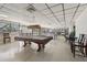Spacious recreation room featuring a pool table, ping pong tables, and library for community enjoyment at 3252 Scorecard Dr, New Port Richey, FL 34655