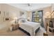 Inviting bedroom with a ceiling fan, cozy decor, and a bright window at 3254 Lori Ln, New Port Richey, FL 34655