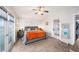 Spacious main bedroom with vaulted ceiling, ceiling fan, neutral walls, and an en-suite bathroom at 3432 Bluefish Dr, Hernando Beach, FL 34607