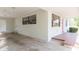 Spacious carport featuring brick accents and providing convenient covered parking at 3502 Bloomingdale Ave, Valrico, FL 33596