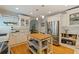 Spacious kitchen with white cabinets, stainless steel appliances, and a butcher block island at 3512 W Santiago St, Tampa, FL 33629