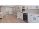 Inviting living area features sleek cabinets, bar fridge, and modern finishes at 3512 W Santiago St, Tampa, FL 33629