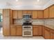 This eat-in kitchen features granite countertops and stainless steel appliances at 4301 Ridgemoor N Dr, Palm Harbor, FL 34685