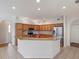 This eat-in kitchen features granite countertops and stainless steel appliances at 4301 Ridgemoor N Dr, Palm Harbor, FL 34685