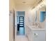 Modern bathroom featuring double sinks with sleek fixtures and decorative lighting at 4530 5Th S Ave, St Petersburg, FL 33711