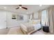 Cozy bedroom features neutral tones, natural light, and a decorative area rug at 4530 5Th S Ave, St Petersburg, FL 33711
