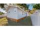 Exterior view of the home featuring a well-maintained lawn and classic design elements at 4530 5Th S Ave, St Petersburg, FL 33711