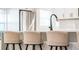 Kitchen bar with seating providing an eat-in option with black and metal finish at 4530 5Th S Ave, St Petersburg, FL 33711