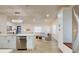 Spacious open concept living and kitchen area featuring modern appliances and stylish decor at 4530 5Th S Ave, St Petersburg, FL 33711