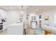 Bright living area features a breakfast bar, open floorplan, and modern lighting at 4530 5Th S Ave, St Petersburg, FL 33711
