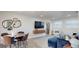 Open concept living and dining area featuring modern decor and furniture at 4530 5Th S Ave, St Petersburg, FL 33711