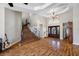 Light filled foyer featuring a grand stairwell and entry to other rooms in the home at 4803 Longwater Way, Tampa, FL 33615