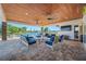 Spacious covered outdoor lanai with comfortable seating and waterfront views at 4803 Longwater Way, Tampa, FL 33615