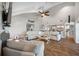 Bright living room opens to the kitchen, featuring high ceilings and comfortable seating at 4803 Longwater Way, Tampa, FL 33615