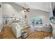 Bright living room featuring high ceilings, wood floors, and views of the waterfront at 4803 Longwater Way, Tampa, FL 33615