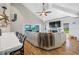 Bright living room with access to a pool and covered patio area at 4803 Longwater Way, Tampa, FL 33615